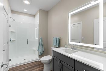 Glass-enclosed showers & soaking tubs